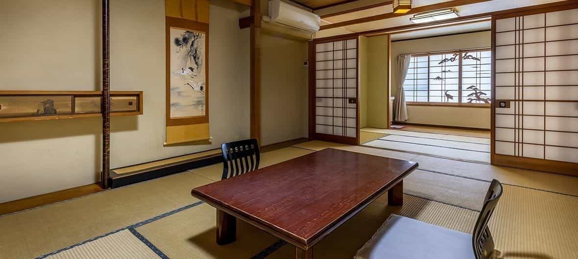 Sleep on tatami in a Japanese-style room at Ryokan Sawaki