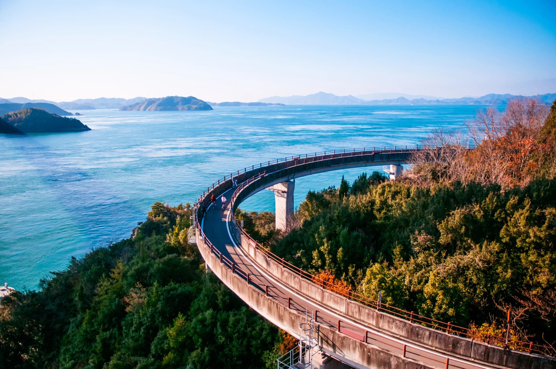 Loop up the spiral ramp to the Kurushima-Kaikyō Bridge