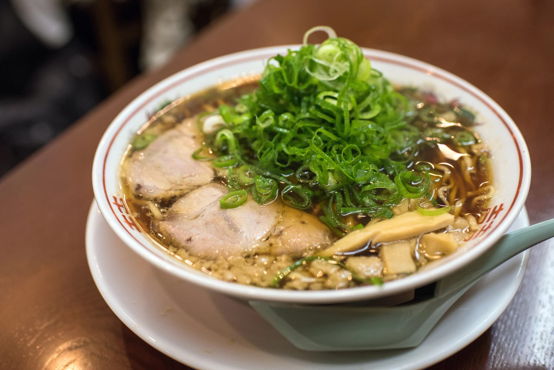 Try Onomichi ramen under a heap of spring onion