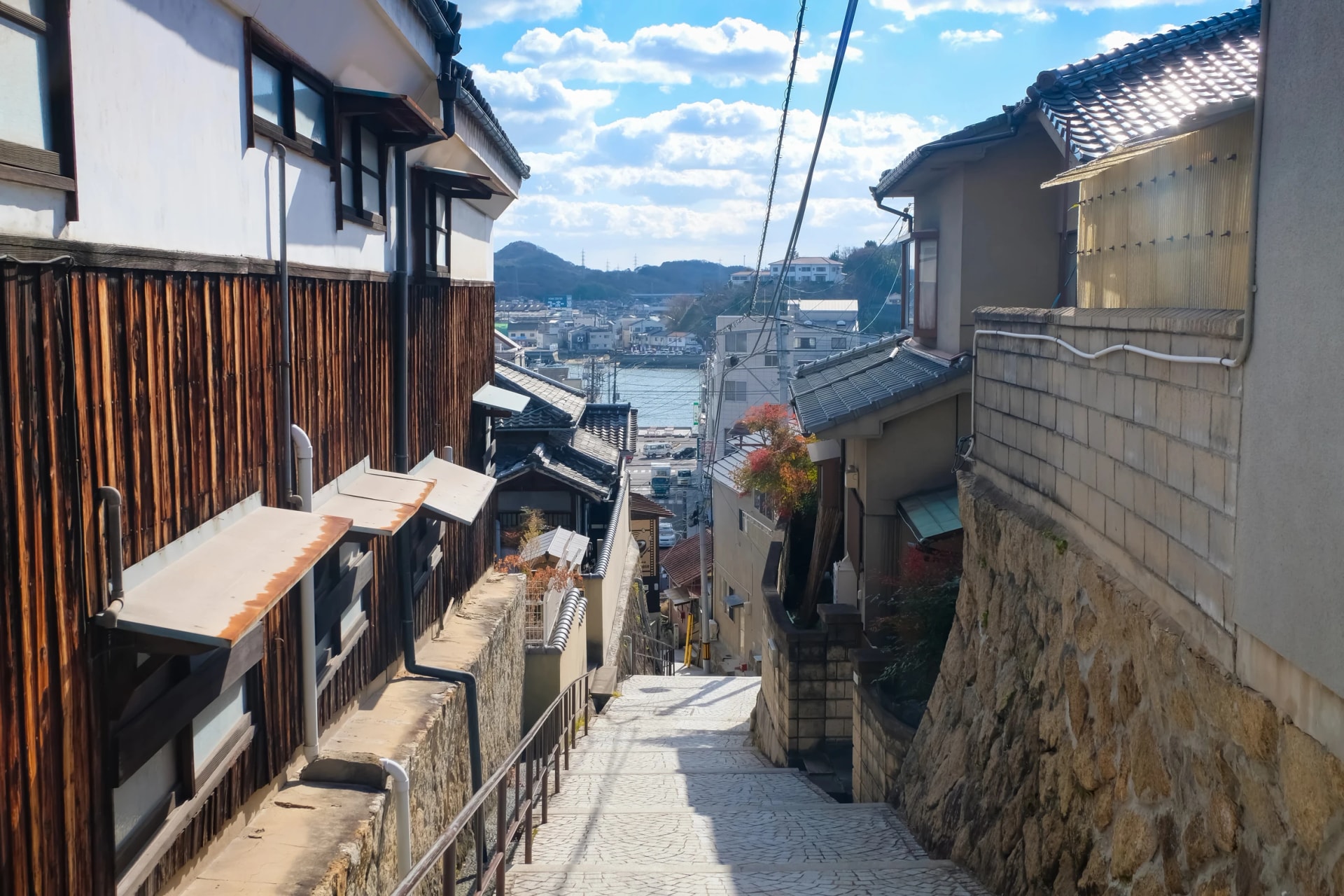 Walk a hillside lane down to the Onomichi channel