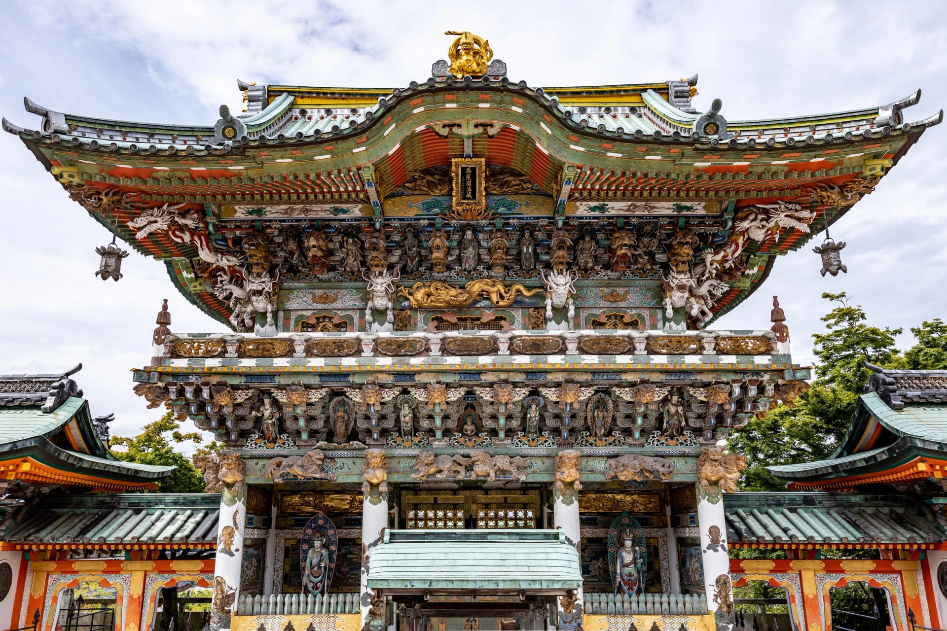 Stand before the ornate halls of Kōsan-ji
