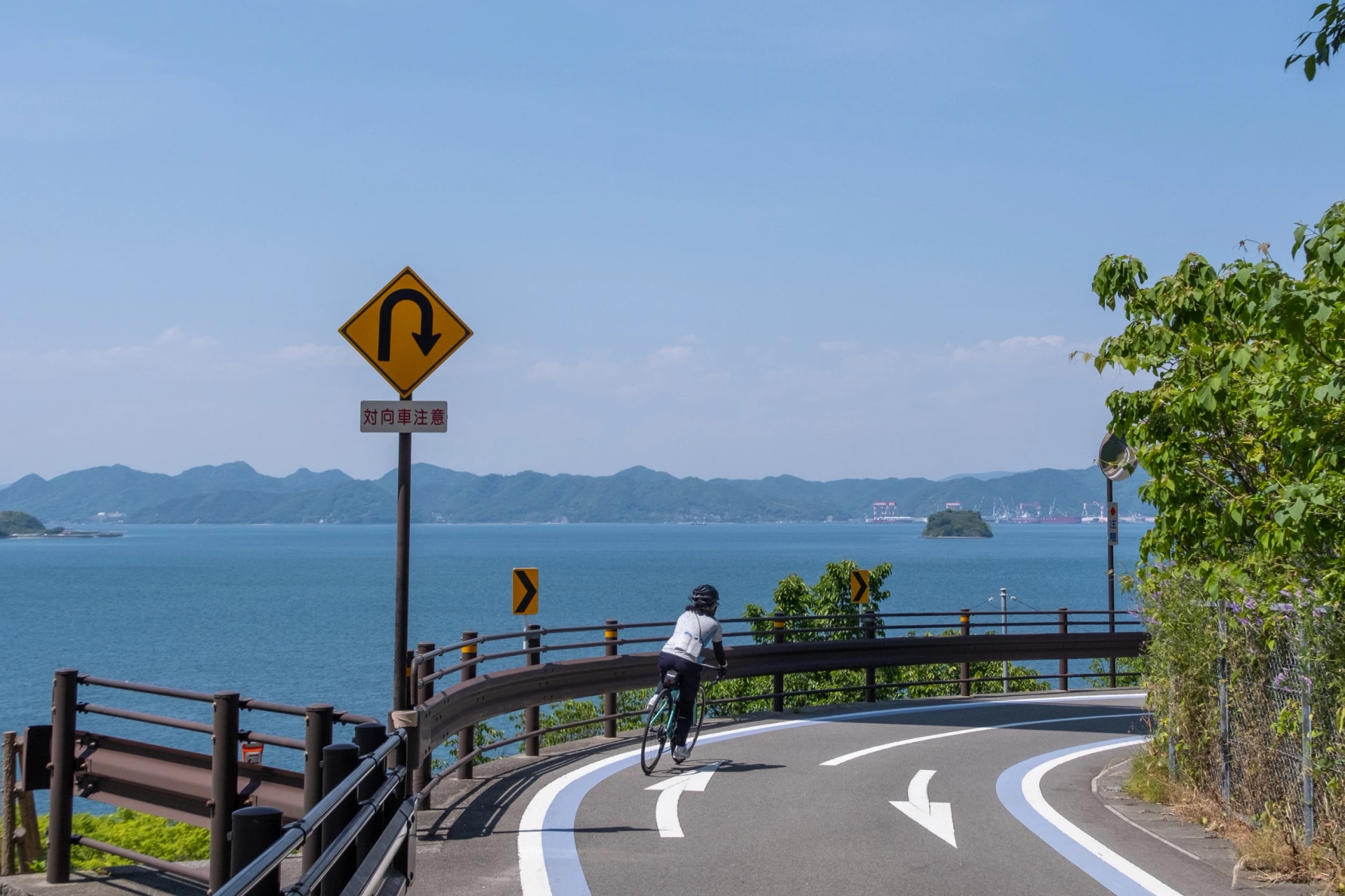 Lean into a bend on the Shimanami Kaido cycle road